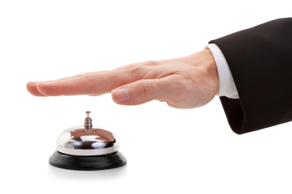 reception bell with hand isolated on white