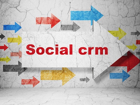 business concept arrow with social crm on grunge textured concrete wall background