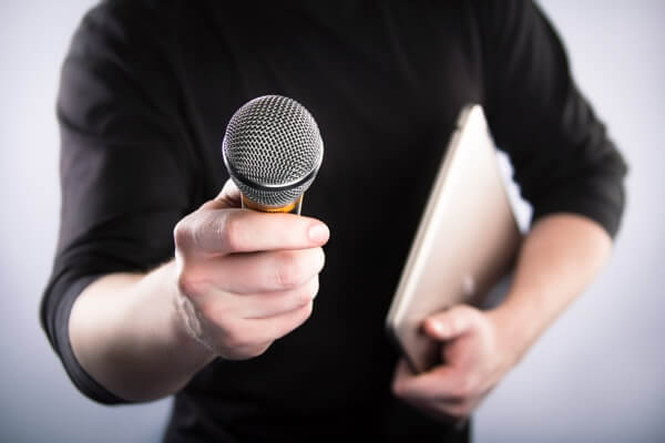 Do an interview with an influencer at your booth to draw a crowd.