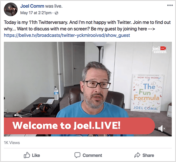 Joel Comm appears in a live video from his office. The walls are bare and white, and a poster showing the cover of The Fun Formula leans against a wall in the background. Joel wears a blue t-shirt and glasses. A lower-third caption says Welcome to Joel.LIVE!