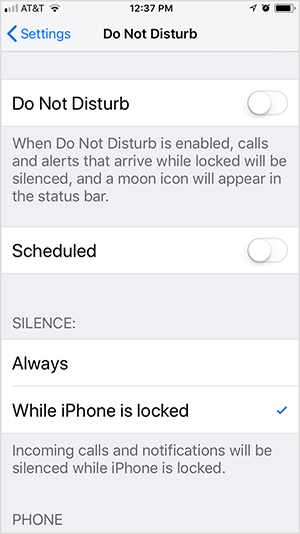 This is a screenshot of iOS Do Not Disturb settings. The first option is to toggle Do Not Disturb on or off. In this screenshot, the setting is off. Below the setting is the text “When Do Not Disturb is enabled, calls and alerts that arrive while locked will be silenced, and a moon icon will appear in the status bar.” Below this option is the Scheduled option, which is toggled off. Then two options for Silence appear: Always or While iPhone Is Locked. In this screenshot, While iPhone is Locked is selected and the following text appears “Incoming calls and notifications will be silenced while iPhone is locked.” Todd Bergin turns on Do Not Disturb and Always silence messages while he’s streaming an Instagram Live video.