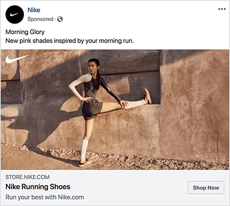 This is a Facebook ad for Nike running shoes. The ad text says “Morning Glory” and on the next line “New pink shades inspired by your morning run.” In the ad photo, an Asian woman is stretching with one leg extended straight out and her foot on a ledge and her other foot on the ground. Her upper half is twisting to the side. She’s wearing pink Nike running shoes, white knee socks, and dark gray running shorts and a tank top. Her hair is pulled up. She’s on a dirt path in front of a stucco- or earthen-looking building. Talia Wolf says Nike is a great example of a brand that uses emotion in advertising.