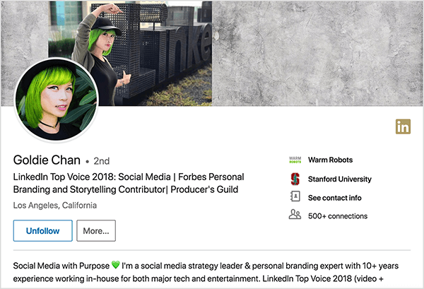 This is a screenshot of Goldie Chan’s LinkedIn profile. She’s an Asian woman with green hair. In her profile photo, she’s wearing makeup, a black choker necklace, and a black shirt. Her tagline says “LinkedIn Top Voice 2018: Social Media | Forbes Personal Branding and Storytelling Contributor | Producer’s Guild”