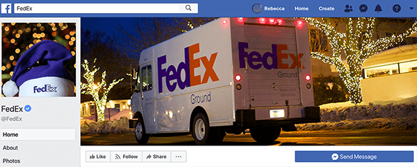 This is a screenshot of the FedEx Facebook page. For the holidays, the profile image is a purple Santa hat with FedEx printed on the white band. The cover photo is a FedEx truck driving by houses decorated with lights.