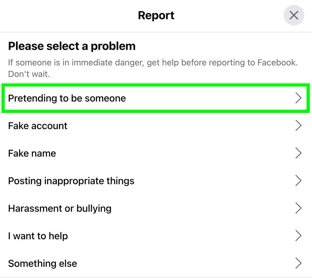 facebook report impersonation